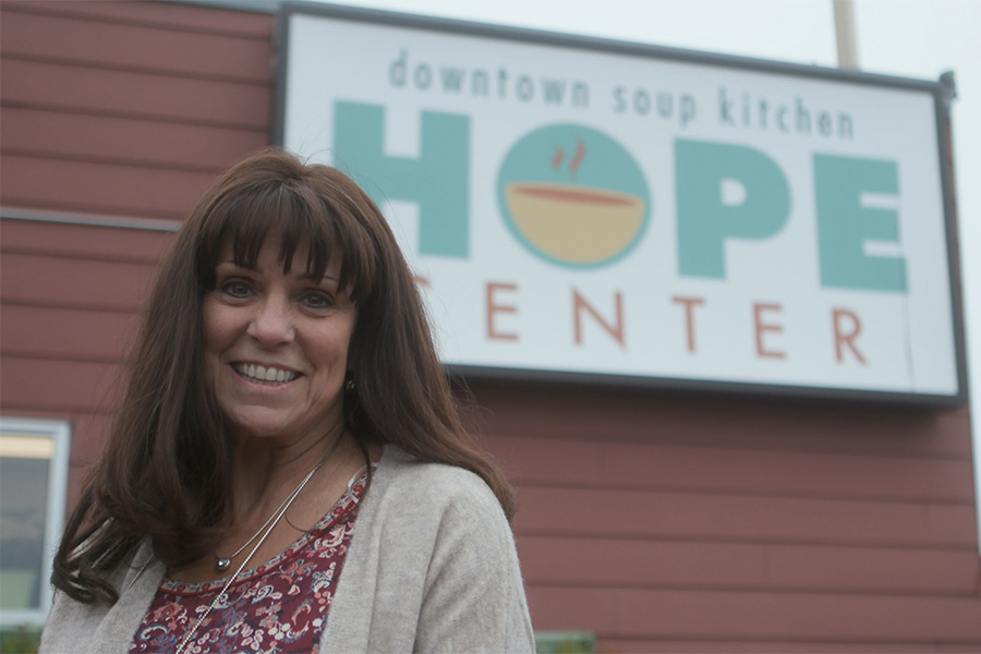 Sherrie Laurie stands outside the Downtown Hope Center in Anchorage, Alaska