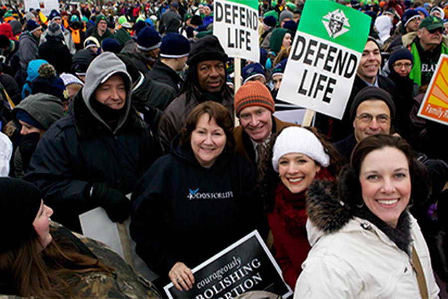 Sue Thayer is pictured at a pro-life gathering