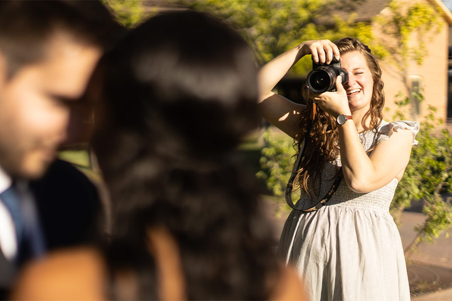 Emilee Carpenter takes photos of a couple